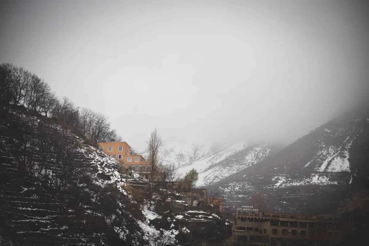 A scenic view of the Atlas Mountains and rural Berber villages