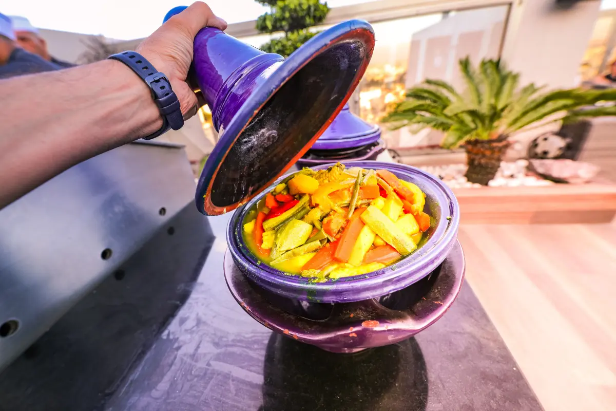 A colorful assortment of spices and a cooking tagine