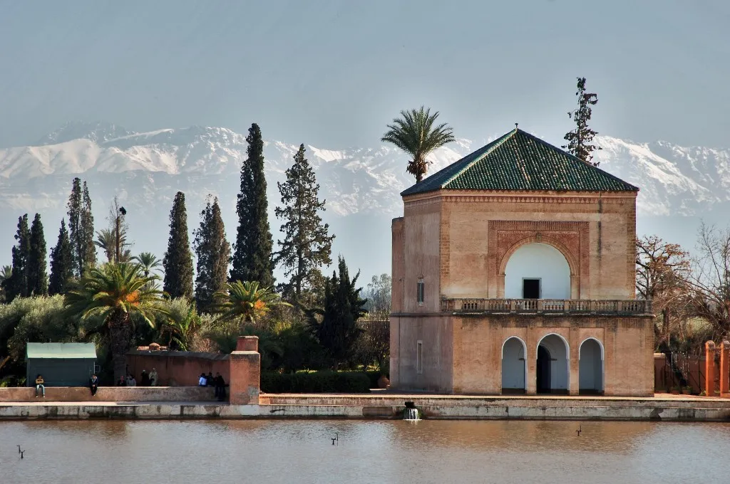 The historic Menara pavilion reflecting in the large basin